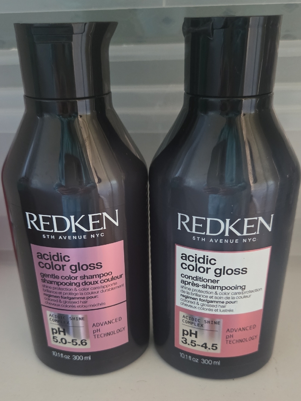 Redken Acidic Color Gloss Shampoo & Conditioner — Black Bottles with Pink Labels